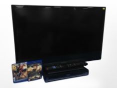 A Panasonic Viera 37 inc LCD TV with lead, Panasonic Blu Ray disc,