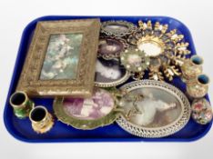 A group of decorative picture frames, gilt sunburst mirror,