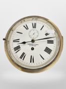 A brass cased ship's timepiece signed Parkes and Sons, Liverpool, with key,