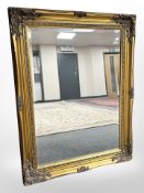 An antique-style beveled mirror, 63cm x 43cm.