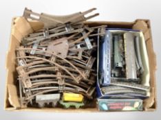 A box of assorted rolling stock including Triang and a large quantity of track