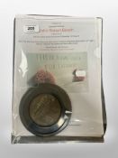 A bronze plaque and assorted paperwork commemorating Lieutenant Colonel John Robert Beech,