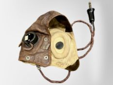 A 20th century British military pilot's cap with war department broad arrow mark and serial number
