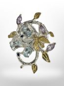 An African blue topaz and amethyst sterling silver gold plated ring