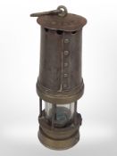 A Patterson of Gateshead on Tyne steel and brass miner's lamp.