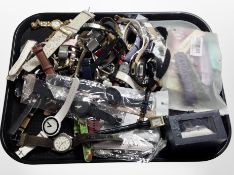 A large quantity of lady's and gent's costume wristwatches.