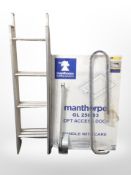 A folding aluminium loft ladder and a boxed loft access door