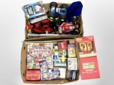 Two boxes containing assorted toys and games, remote-controlled cars, boxed block lights, etc.