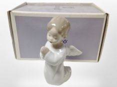 A Lladró figure of an angel in associated box.