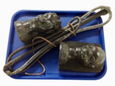 A pair of African carved hardwood figural bookends, height 18cm,