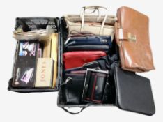 Two crates containing ladY'S handbags and purses, ephemera, Russell Hobbs iron, etc.