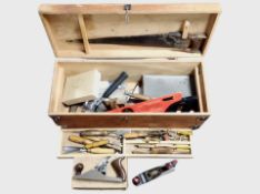 Two antique joiner's tool boxes containing carpentry tools and woodworking planes including Stanley