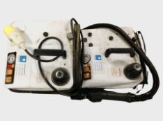 Two Robby 5000 steam cleaners