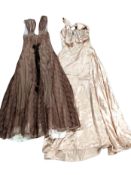 A lady's pink silk dress, and a further lace dress.