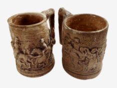 Two earthenware tankards marked 'Blaydon Races 1862' and 'John Peel', tallest 15cm.