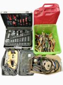 An aluminium case containing spanners and screwdrivers, together with a disc grinder,