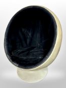A 20th century moulded plastic egg chair,