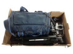 A Praktica MTL3 camera body together with a tripod, Helios lens, plus one other,