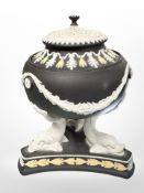 A Wedgwood black Jasperware pastille burner, height 14cm.