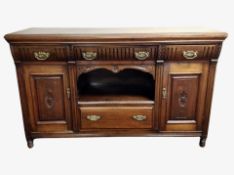 A Victorian oak sideboard,