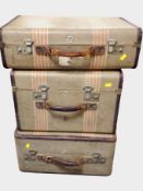 Three Revelation canvas luggage cases