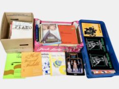 Three boxes containing sheet music books.