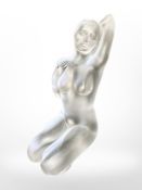 A Lalique figure of a seated nude female, height 13cm, signed 'Lalique France' to base, boxed.