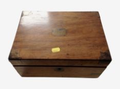 A Victorian walnut and brass-mounted writing slope with tooled leather interior, width 29cm.