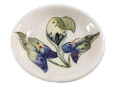A Moorcroft circular dish, diameter 18.5cm.