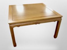 A Chinese carved hardwood square coffee table,