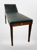 An early 20th century doctor's examination table,