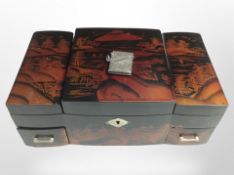An oriental lacquered jewellery box and a silver vesta case.