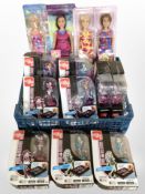 A group of Barbie dolls and Apptivity figures, all boxed.