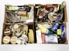 Four boxes containing home electricals, kitchenalia, silver-plated wares, dinner china, etc.