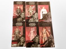 A group of Hasbro Disney Star Wars action figures.