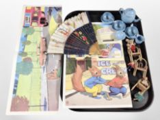 A 20th-century miniature enameled part tea set, miniature dolls and chairs, painted hand fan,