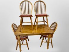 A contemporary pine dining table,