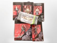 A group of Hasbro Disney Star Wars action figures.