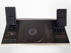 A Bang and Olufsen Beo Center 2000 with continental plugs, together with a pair of Dantax speakers.