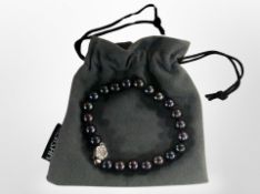 A Zenzhu freshwater black pearl bracelet.
