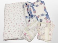 Two vintage Durham-style quilts.