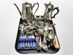 A Victorian silver-plated teapot, together with one other example and a quantity of cutlery.