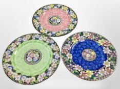 Three Maling lustre plates, diameter 28.