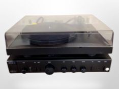 A Project Audio Systems turntable, and a Arcam Alpha 5 Plus amplifier.