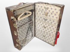 A Watajoy travelling wardrobe trunk with fitted interior, length 93cm.