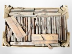 A collection of antique woodworking planes.