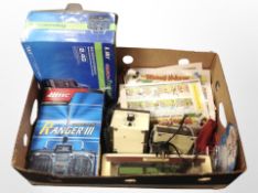 Two boxed remote-control handset, together with railway track components,