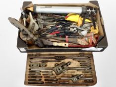 A box of antique and later tools, vintage blow lamp, together with a picnic bag, etc.