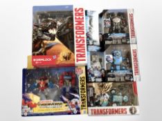 A group of Hasbro transformers action figures.