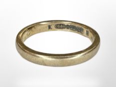 A 9ct gold band ring, size J CONDITION REPORT: 2.